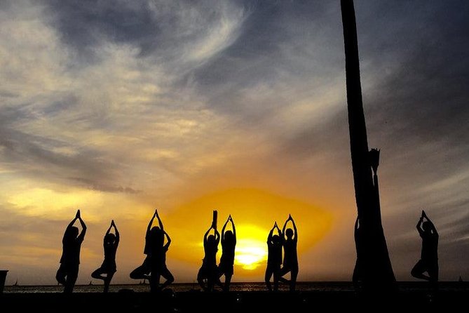 Beach Yoga on Waikiki with Diamondhead Backdrop - Morning calm vs sunset flow: choosing the right time