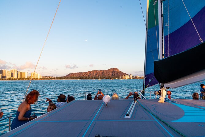 Board from Waikiki Beach for a scenic Sunset Sail on the Hāwea - Onboard Music, Crew Personality, and the Vibe You’ll Feel