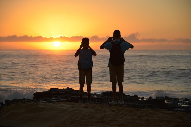 First Day Must: Oahu Sunrise & Circle Island Adventure - Kawela Bay: banyan vines and the Tarzan moment