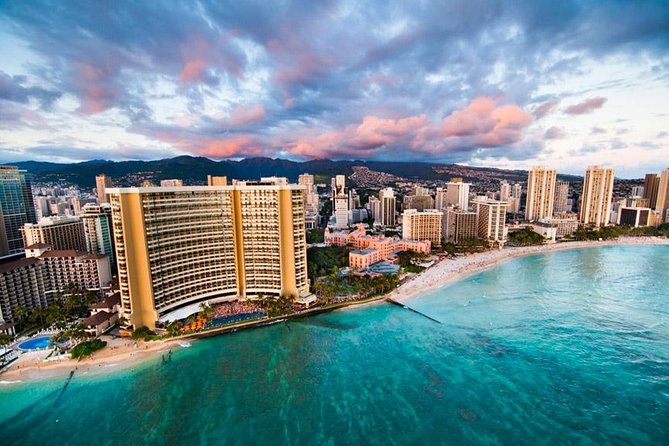 Oahu: 45 Minute Sights Unseen Helicopter Tour - Doors Off or On - Pearl Harbor and the USS Arizona Memorial pass: a solemn aerial view