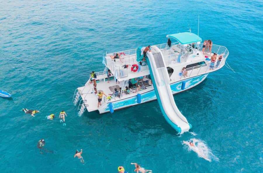 Oahu: Dolphin Watching & Turtle Snorkeling with Waterslide - A short Oahu cruise with dolphins, honu, and a 20-foot waterslide