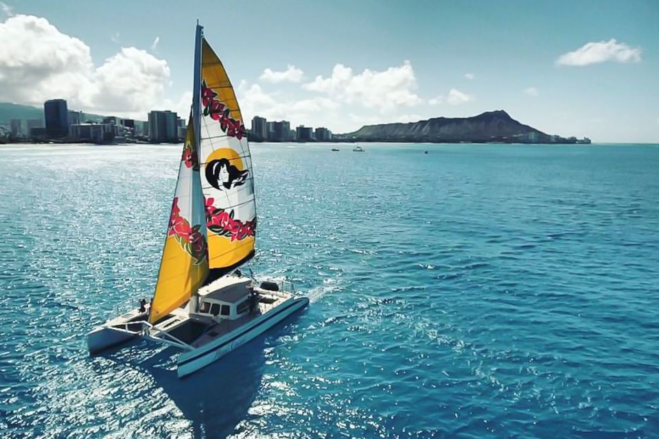 Oahu: Waikiki Eco-Friendly Morning Whale Watching Cruise - What Happens During the 2 Hours: From Waikiki Coastline Scanning to Close Encounters