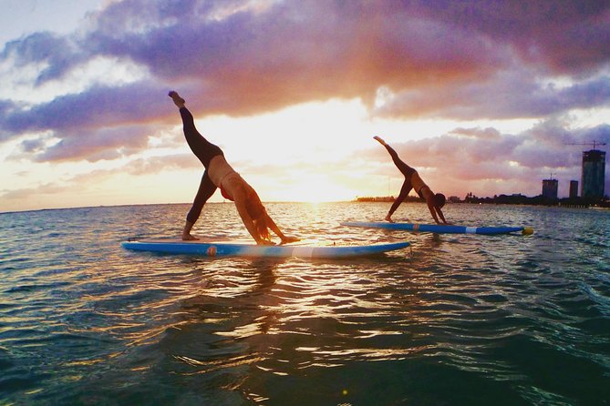 Paddleboard Yoga Class in Honolulu - The end: deep stretching and savasana rocking in Hawaiian waves