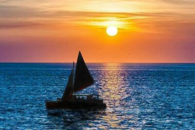 Polynesian Canoe Sunset Sail - The sailing rhythm: music first, learning in the middle, sunset at the end
