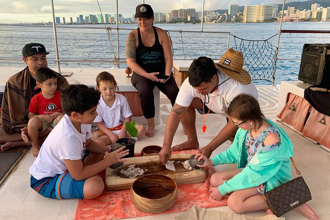 Polynesian Canoe Sunset Sail - The cultural program: chants, ukulele, lei making, hula, and poi