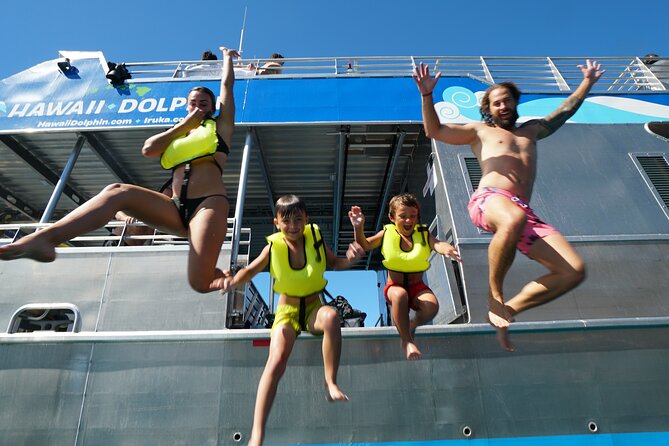 Swim with Dolphins Catamaran with Waterslide & Lunch on Oahu - The 21-ft waterslide and the “something for everyone” water block