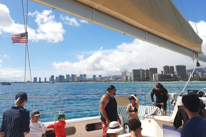 Waikiki 3pm Tradewind Sail - Open Bar Included - The onboard vibe: wind, music, and a crew that keeps it light