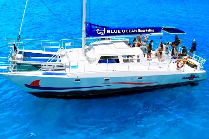 Waikiki Catamaran Escape: Snorkel with Turtles & Water Sports Fun - Onboard Comfort: Food, Drinks, Restrooms, and Photo-Friendly Breaks