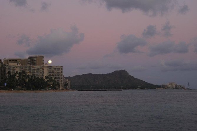 Waikiki Signature Sunset Catamaran Sail - Diamond Head at sunset: the turnaround, the crater silhouette, and the green flash hunt